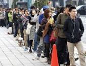 Fila de clientes por iPhone 4S no Japão