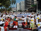 Inclusão é tema de caminhada na orla de Maceió