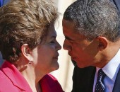 Dilma Rousseff e Barack Obama se cumprimentam na chegada para a foto dos representantes na reunião do G20, em São Petersburgo, na Rússia