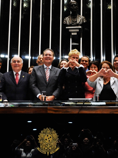 Renan com a apresentadora Xuxa durante a votação da "Lei da Palmada"